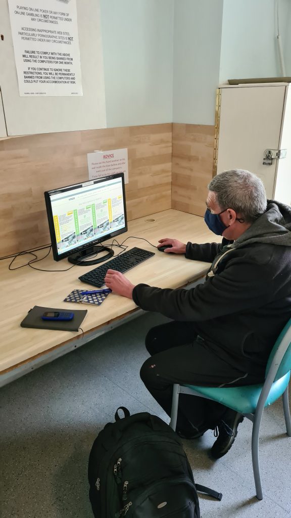 man sitting at a desk